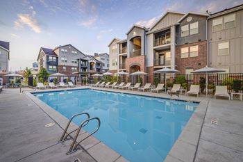 Resort-inspired pool and spa with seating